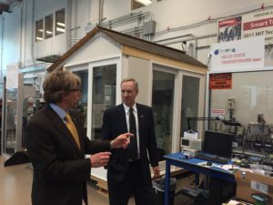 Dr. Ewan Pritchard points out the DC appliances in the experimental house at FREEDM. 